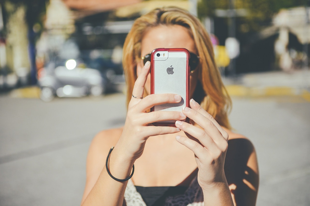 Person taking a photo with smartphone